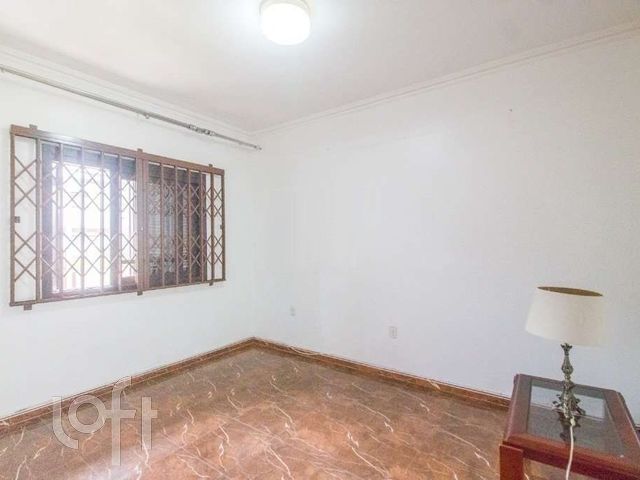 Casa com 322m², 4 dormitórios, 1 suíte, 7 vagas, Menino Deus em Porto Alegre