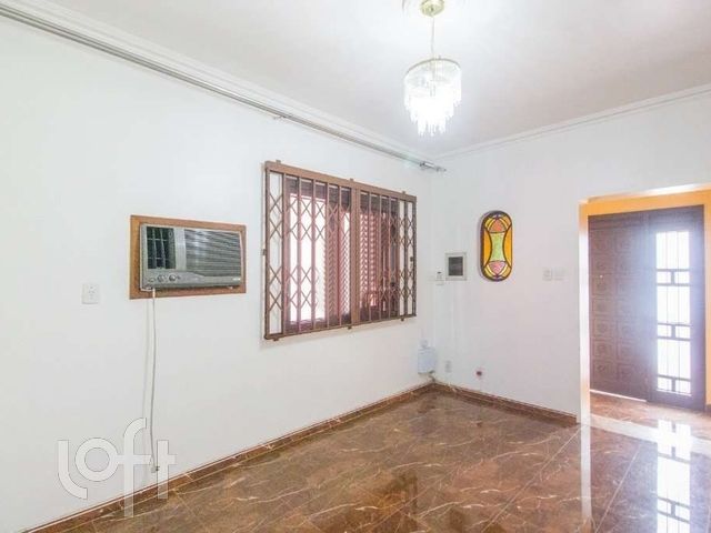 Casa com 322m², 4 dormitórios, 1 suíte, 7 vagas, Menino Deus em Porto Alegre