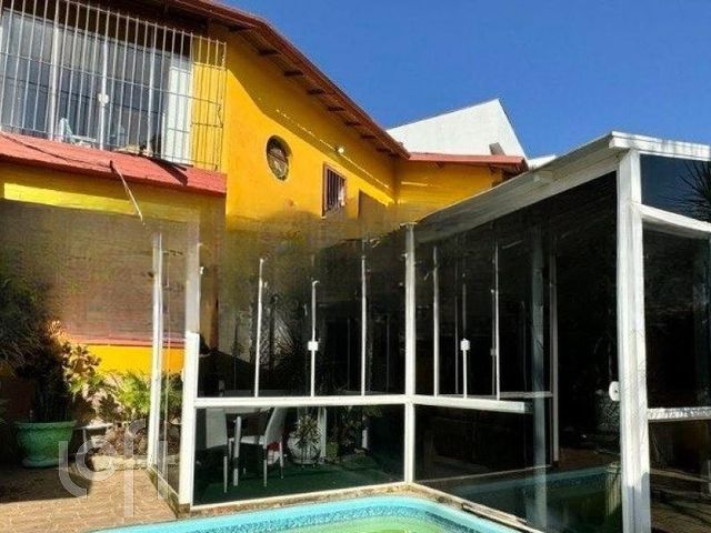 Casa com 300m², 3 dormitórios, 4 vagas, Vila Ipiranga em Porto Alegre