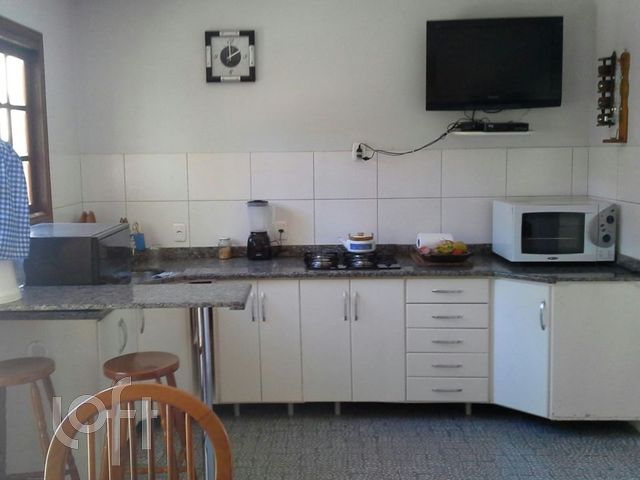 Casa com 236m², 4 dormitórios, 1 suíte, 2 vagas, Santana em Porto Alegre