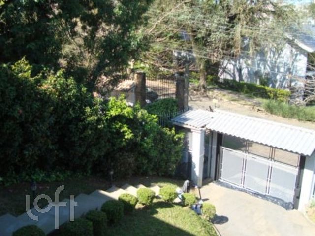 Casa com 510m², 3 dormitórios, 3 suítes, 6 vagas, Três Figueiras em Porto Alegre