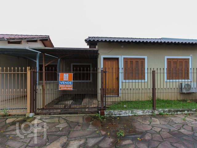 Casa com 65m², 2 dormitórios, 1 vaga no bairro Igará em Canoas para Comprar