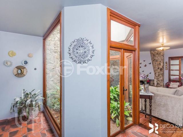 Casa com 380m², 4 dormitórios, 2 suítes, 3 vagas, Chácara das Pedras em Porto Alegre