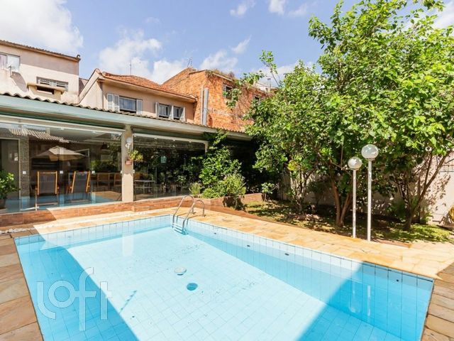 Casa com 344m², 3 dormitórios, 1 suíte, 2 vagas, Chácara das Pedras em Porto Alegre