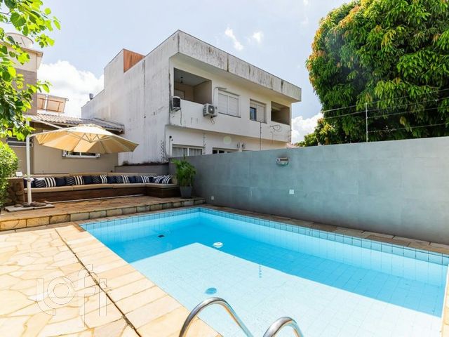 Casa com 344m², 3 dormitórios, 1 suíte, 2 vagas, Chácara das Pedras em Porto Alegre