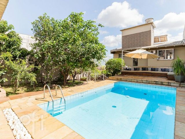 Casa com 344m², 3 dormitórios, 1 suíte, 2 vagas, Chácara das Pedras em Porto Alegre