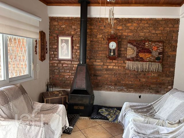 Casa com 160m², 3 dormitórios, 1 suíte, Rio Branco em Porto Alegre