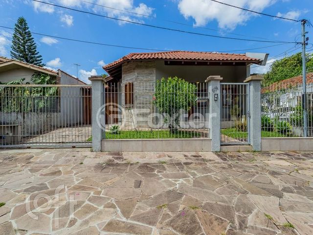 Casa com 360m², 3 dormitórios, 1 suíte, 2 vagas, Chácara das Pedras em Porto Alegre