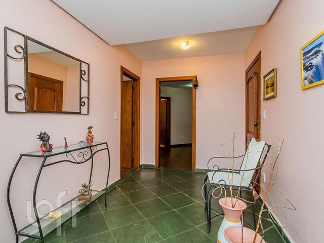 Casa com 360m², 3 dormitórios, 1 suíte, 2 vagas, Chácara das Pedras em Porto Alegre