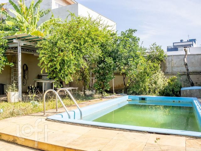 Casa com 312m², 5 dormitórios, 2 suítes, 5 vagas, Chácara das Pedras em Porto Alegre