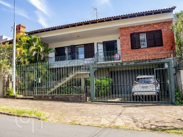 Casa com 312m², 5 dormitórios, 2 suítes, 5 vagas, Chácara das Pedras em Porto Alegre