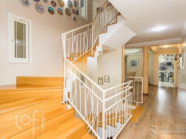 Casa com 344m², 4 dormitórios, 3 suítes, 3 vagas, Chácara das Pedras em Porto Alegre