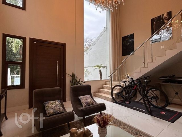 Casa com 343m², 3 dormitórios, 3 suítes, 2 vagas, Jardim Botânico em Porto Alegre