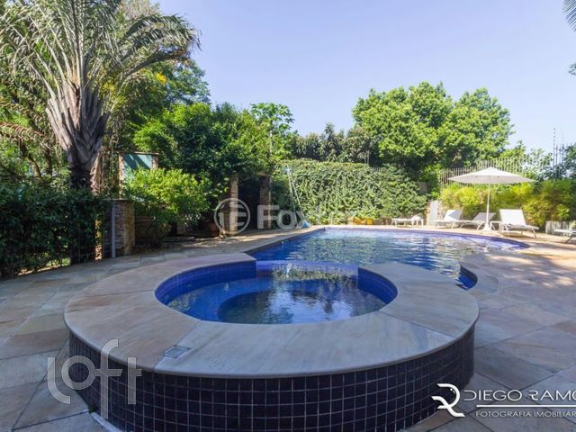 Casa em Condomínio com 488m², 3 dormitórios, 3 suítes, 6 vagas, Três Figueiras em Porto Alegre