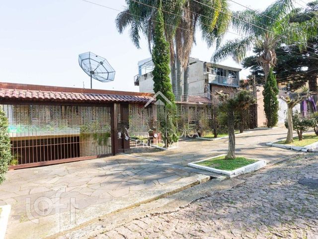 Casa com 470m², 7 dormitórios, 2 suítes, Chácara das Pedras em Porto Alegre