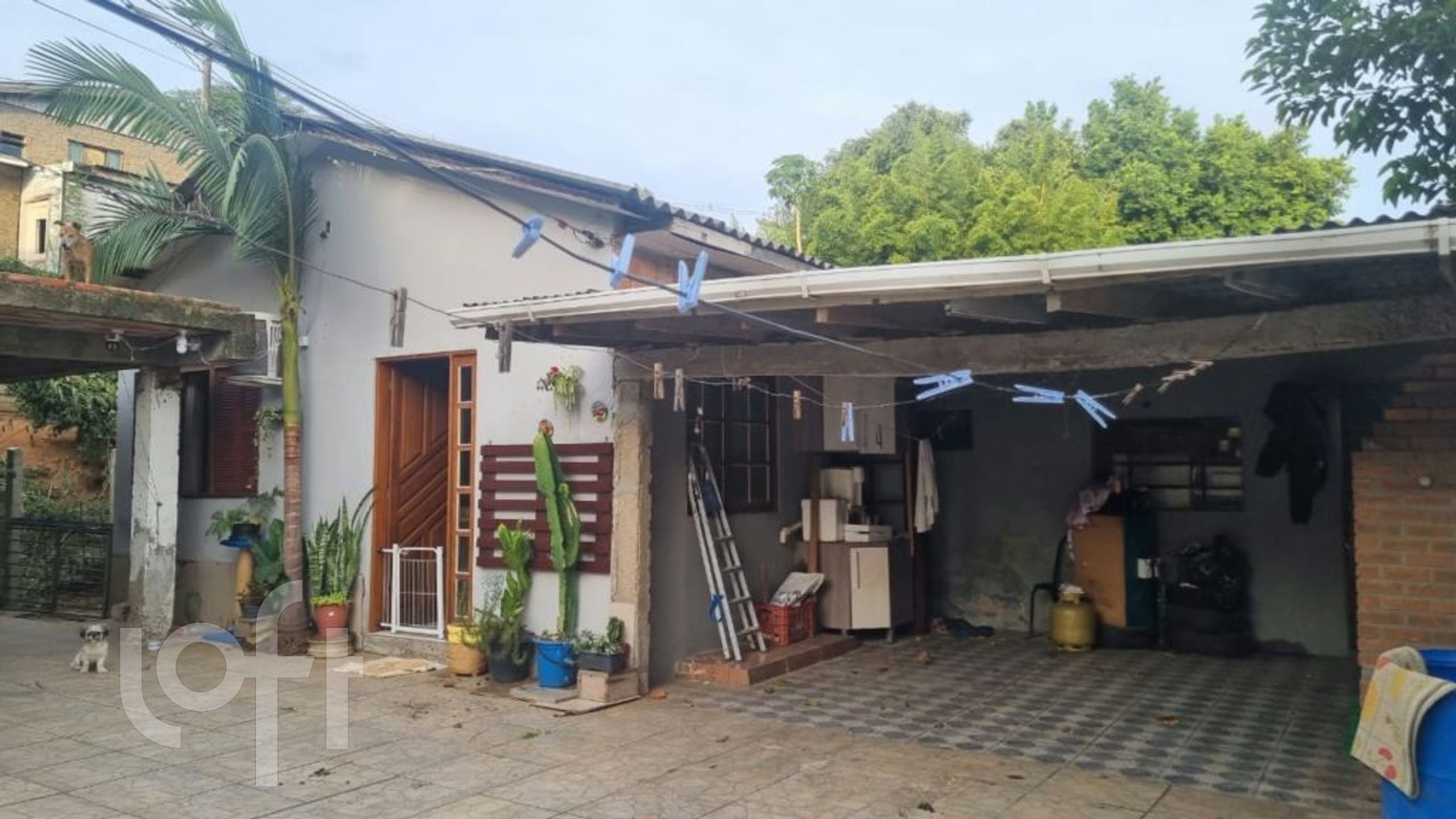 Casa com 54m², 2 dormitórios, 3 vagas, Jardim Botânico em Porto Alegre