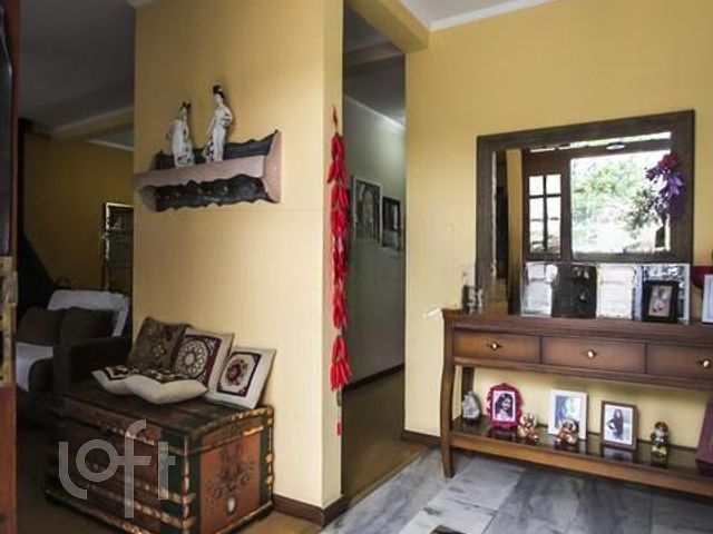 Casa com 315m², 3 dormitórios, 1 suíte, 4 vagas, Vila Ipiranga em Porto Alegre