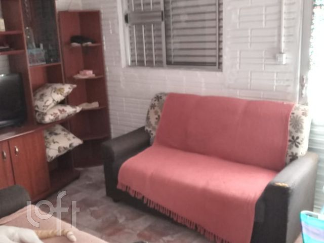 Casa com 32m², 3 dormitórios no bairro Guajuviras em Canoas para Comprar