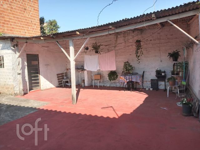 Casa com 32m², 3 dormitórios no bairro Guajuviras em Canoas para Comprar