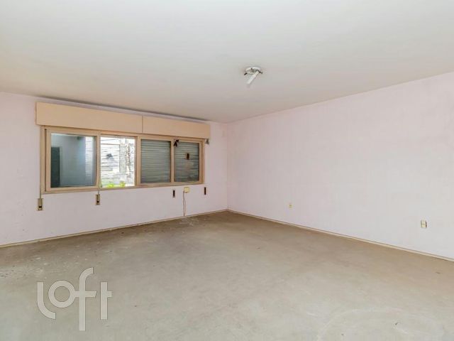 Casa com 304m², 4 dormitórios, 2 suítes, 2 vagas, Rio Branco em Porto Alegre