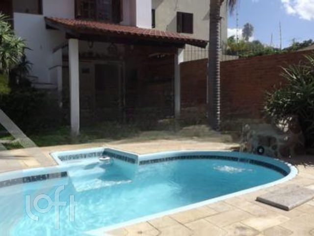 Casa com 250m², 5 dormitórios, 1 suíte, 3 vagas, Chácara das Pedras em Porto Alegre