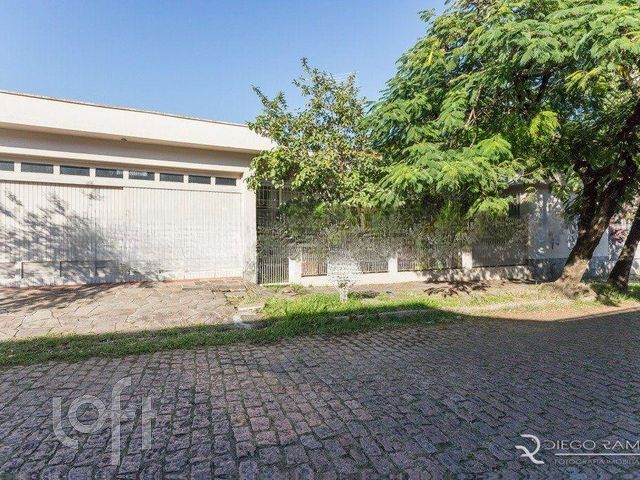 Casa com 214m², 3 dormitórios, 1 suíte, 3 vagas, Chácara das Pedras em Porto Alegre