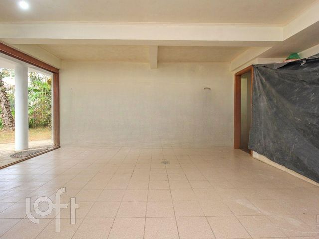 Casa com 374m², 4 dormitórios, 1 suíte, 3 vagas, Chácara das Pedras em Porto Alegre
