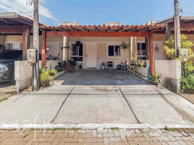 Casa com 57m², 2 dormitórios no bairro Olaria em Canoas para Comprar