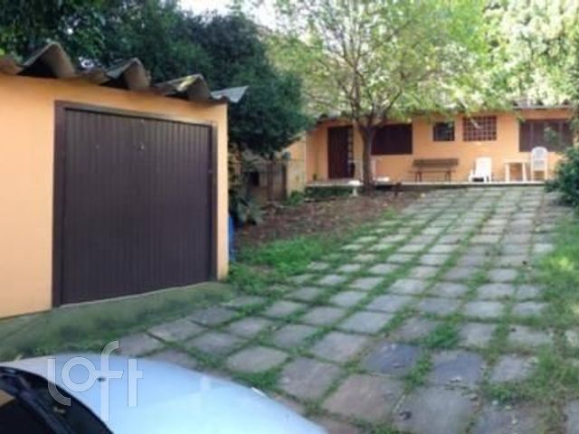 Casa com 435m², 3 dormitórios, 1 suíte, 6 vagas, Chácara das Pedras em Porto Alegre