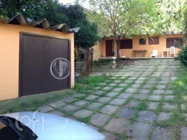 Casa com 435m², 3 dormitórios, 1 suíte, 6 vagas, Chácara das Pedras em Porto Alegre