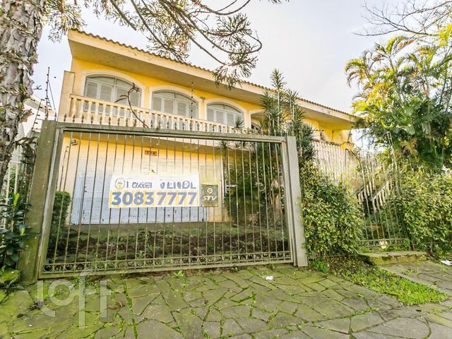 Casa com 600m², 5 dormitórios, 3 suítes, 3 vagas, Chácara das Pedras em Porto Alegre