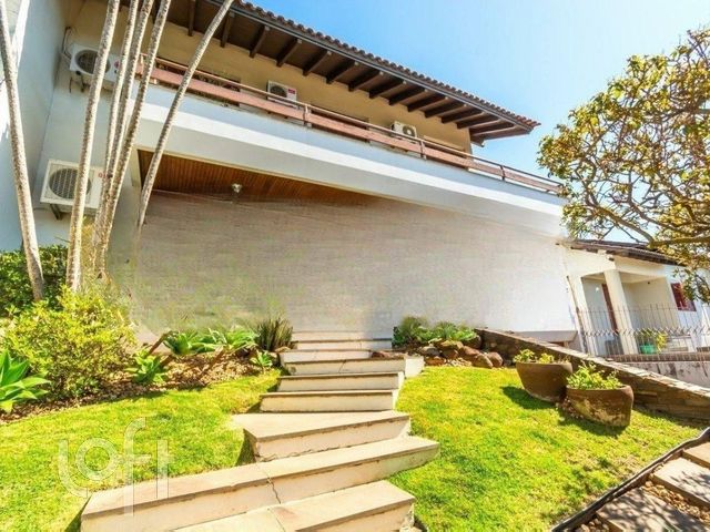 Casa com 338m², 4 dormitórios, 1 suíte, 4 vagas, Chácara das Pedras em Porto Alegre