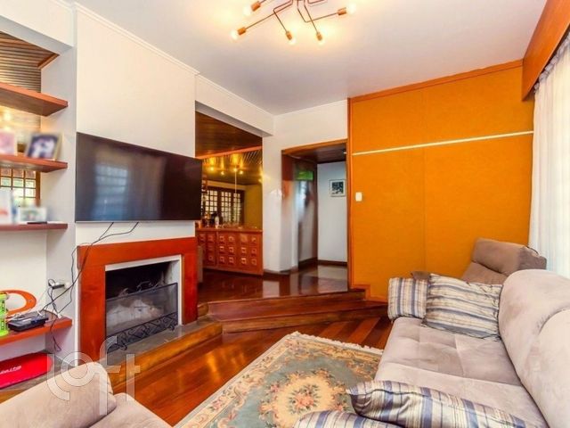 Casa com 338m², 4 dormitórios, 1 suíte, 4 vagas, Chácara das Pedras em Porto Alegre