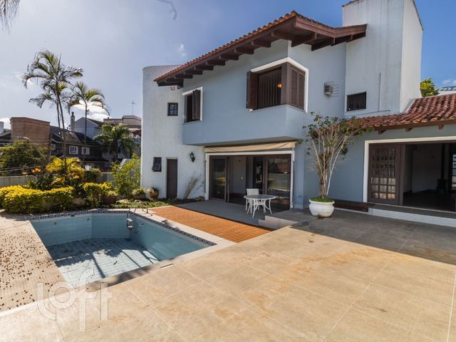 Casa com 394m², 4 dormitórios, 4 suítes, Chácara das Pedras em Porto Alegre