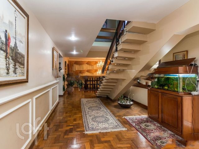 Casa com 400m², 4 dormitórios, 2 suítes, 5 vagas, Três Figueiras em Porto Alegre