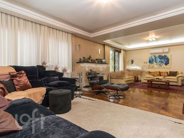 Casa com 400m², 4 dormitórios, 2 suítes, 5 vagas, Três Figueiras em Porto Alegre