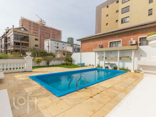Casa com 600m², 5 dormitórios, 3 suítes, 6 vagas, Menino Deus em Porto Alegre