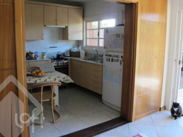 Casa em Condomínio com 222m², 3 dormitórios, 1 suíte, 3 vagas, Três Figueiras em Porto Alegre