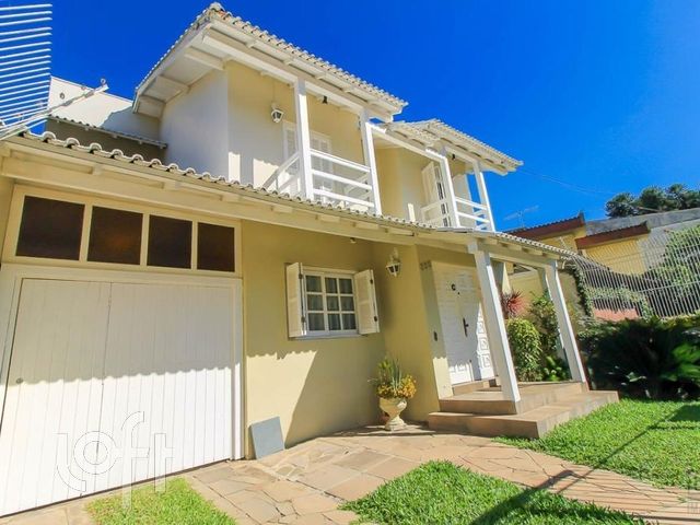Casa com 600m², 3 dormitórios, 1 suíte, 3 vagas, Chácara das Pedras em Porto Alegre