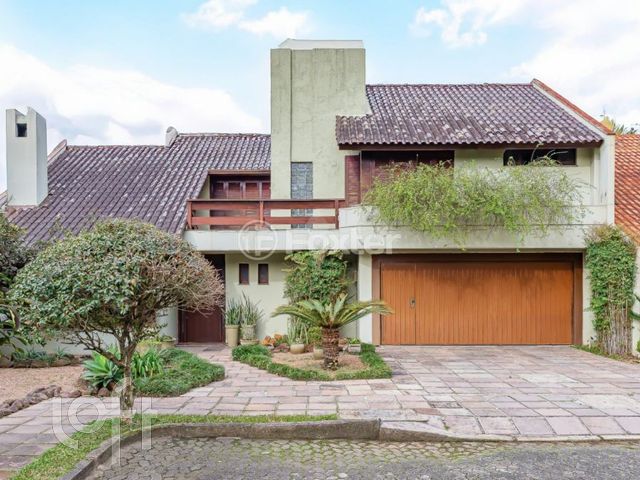 Casa em Condomínio com 330m², 4 dormitórios, 2 suítes, 4 vagas, Jardim Botânico em Porto Alegre