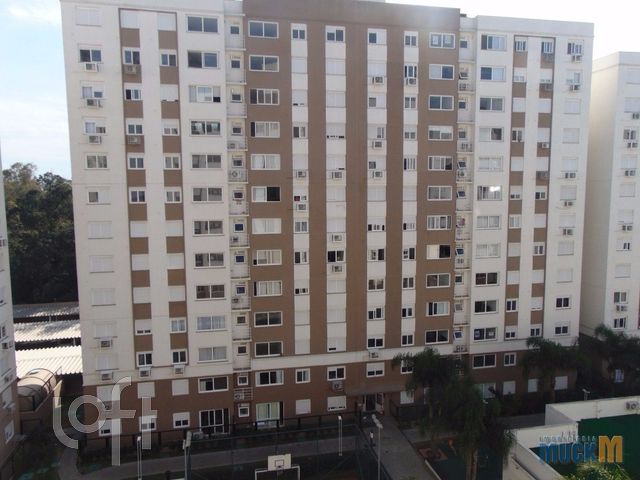 Apartamento com 78m², 3 dormitórios, 1 suíte, 2 vagas no bairro Marechal Rondon em Canoas para Comprar