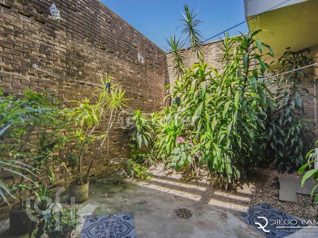 Casa com 457m², 4 dormitórios, 1 suíte, 9 vagas, Chácara das Pedras em Porto Alegre