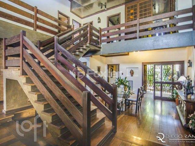 Casa com 457m², 4 dormitórios, 1 suíte, 9 vagas, Chácara das Pedras em Porto Alegre