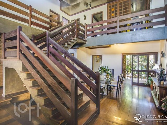 Casa com 457m², 4 dormitórios, 1 suíte, 9 vagas, Chácara das Pedras em Porto Alegre