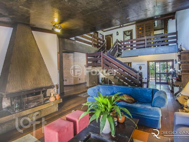 Casa com 457m², 4 dormitórios, 1 suíte, 9 vagas, Chácara das Pedras em Porto Alegre