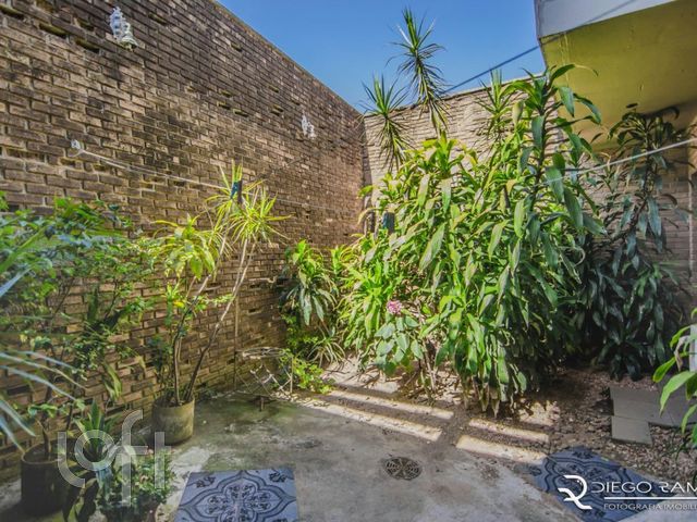 Casa com 457m², 4 dormitórios, 1 suíte, 9 vagas, Chácara das Pedras em Porto Alegre