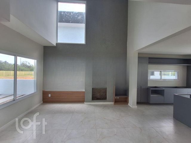 Casa em Condomínio com 133m², 3 dormitórios, 1 suíte, 2 vagas, Rio Branco em Porto Alegre