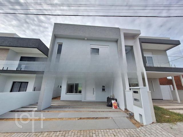 Casa em Condomínio com 133m², 3 dormitórios, 1 suíte, 2 vagas, Rio Branco em Porto Alegre