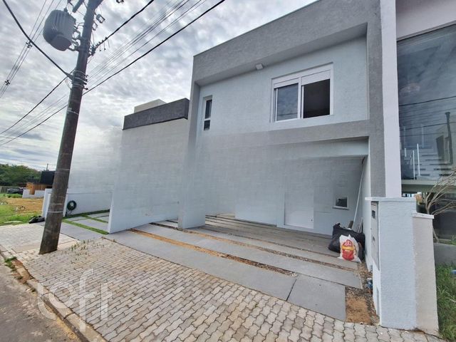 Casa em Condomínio com 133m², 3 dormitórios, 1 suíte, 2 vagas, Rio Branco em Porto Alegre