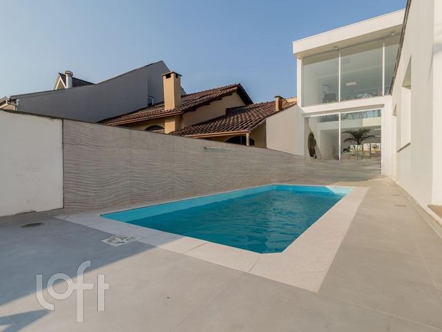 Casa com 178m², 3 dormitórios, 1 suíte, 3 vagas, Chácara das Pedras em Porto Alegre